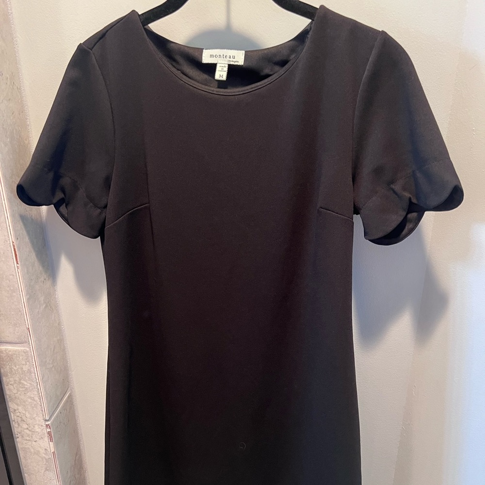 Little black dress with scallop sleeve detail